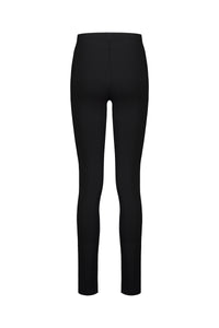 The Vassalli Toll Pant - Black is a full-length, high-waisted pull-on legging with a fitted silhouette in stretch fabric. Shown from the back against a plain white background, these leggings have no visible patterns or embellishments.