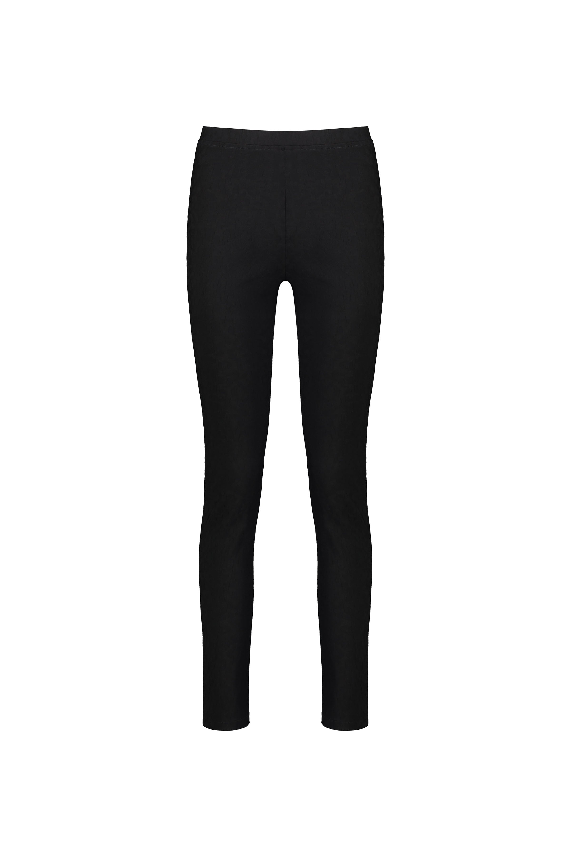 A pair of Vassalli Origin Pull On - Black pants is shown on a plain white background. These skinny-leg, slim-fit pants offer stretch fabric for comfort and feature a sleek look with no visible pockets, zippers, or embellishments.