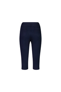Back view of the Vassalli Atlas 3/4 Pant in navy, featuring a skinny leg fit, two back pockets, and an elastic waistband, shown on a plain white background.
