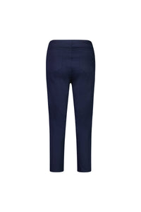 The Vassalli Harbour 7/8 Pant in navy is a women's skinny leg, ankle-length pull-on pant with two rear pockets, made from comfortable cotton stretch and shown from the back on a white background.