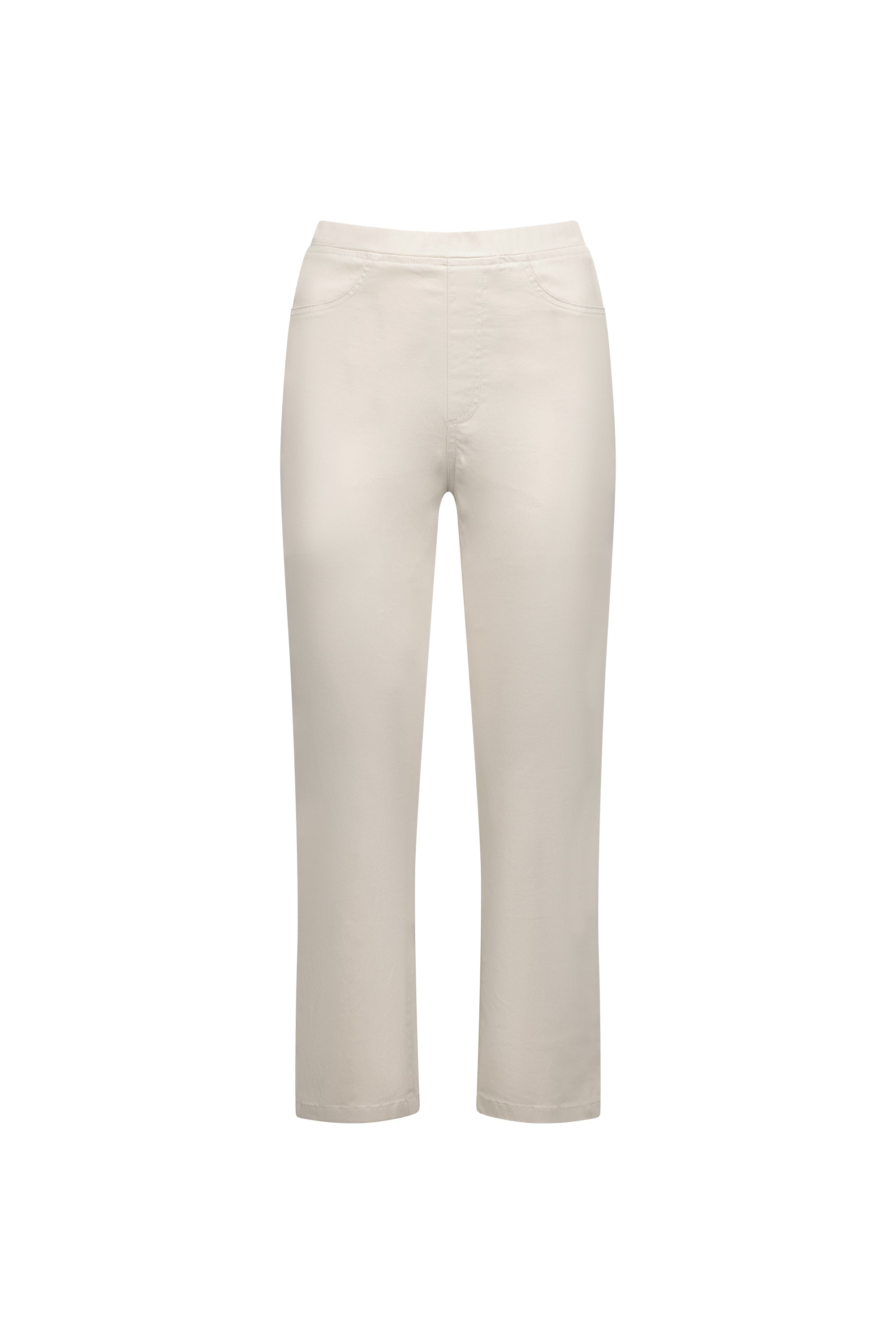 The Vassalli Sierra 7/8 Pant in Pumice features a beige, straight-leg, pull-on design with a smooth front, subtle waist seams, no visible fastenings, and comfortable stretch fabric. Shown against a plain white background.