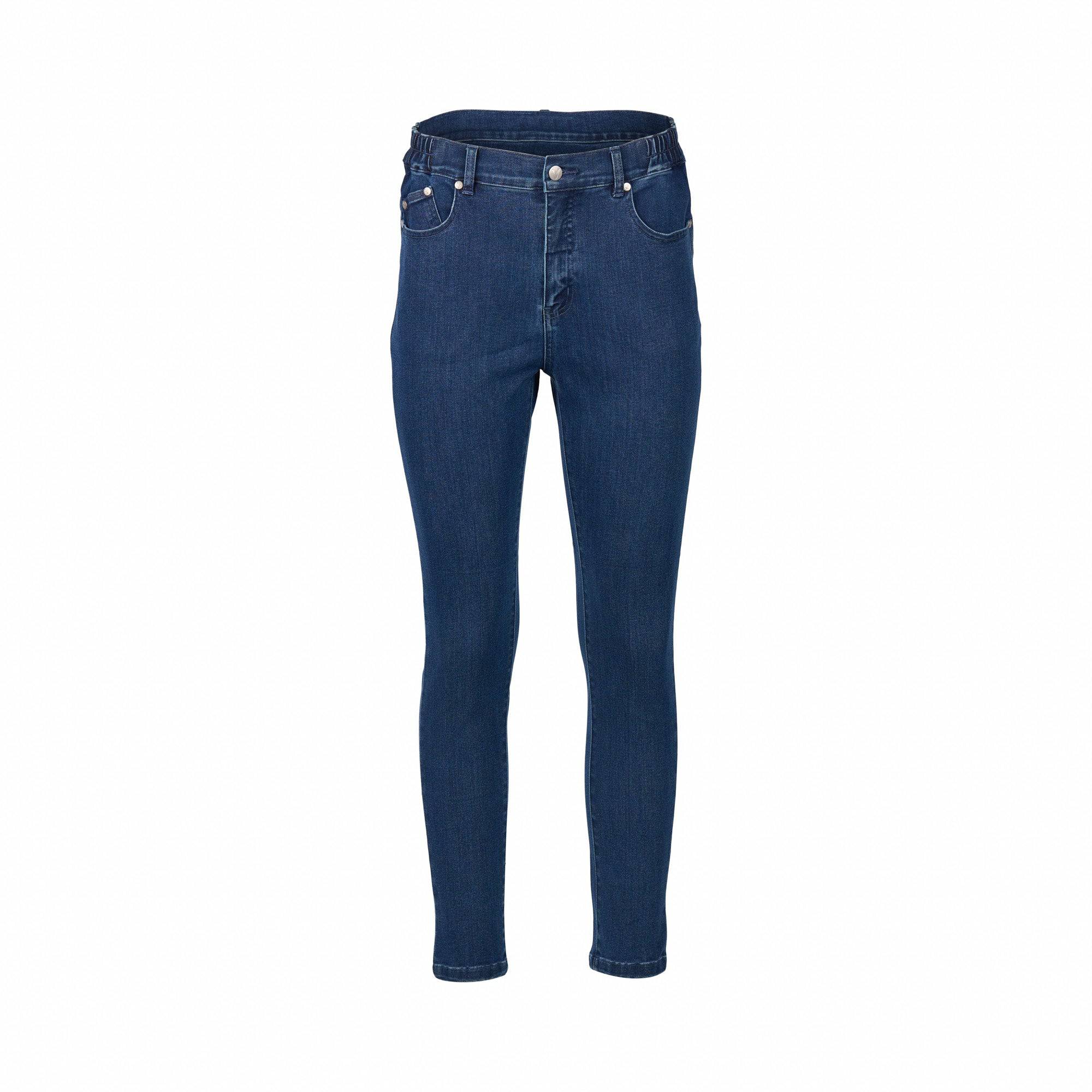 A pair of Vassalli Mode Jean - Blue Denim, high-waisted skinny leg ankle grazer jeans with pockets, silver button, visible stitching, and side waistband elastic, shown on a plain white background.