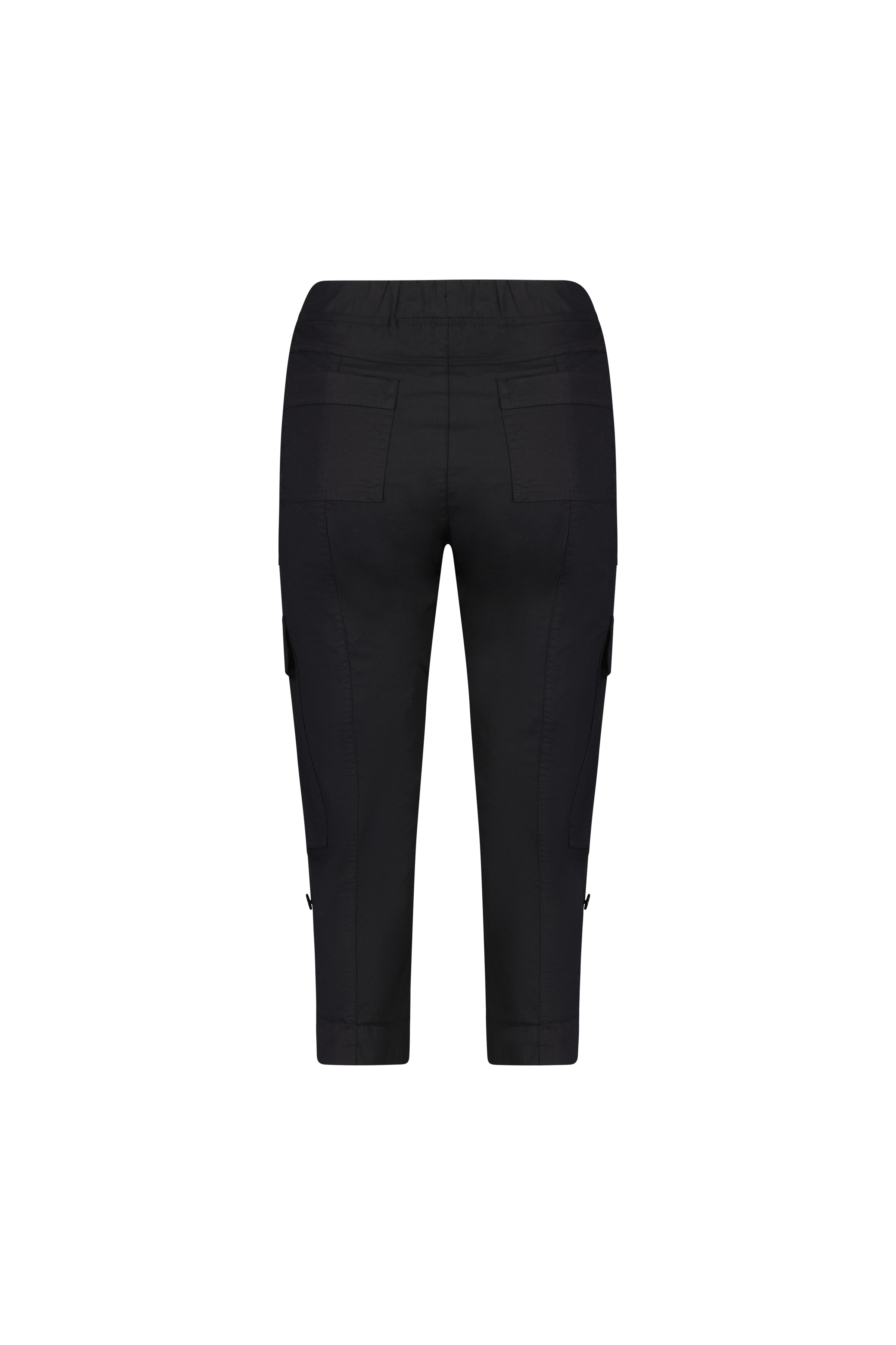 The Vassalli Wave Pant - Black is a cropped cargo style shown from the back, made from stretch poplin. It features side and back patch pockets, an adjustable waistband, and straight legs. Displayed on a plain white background.