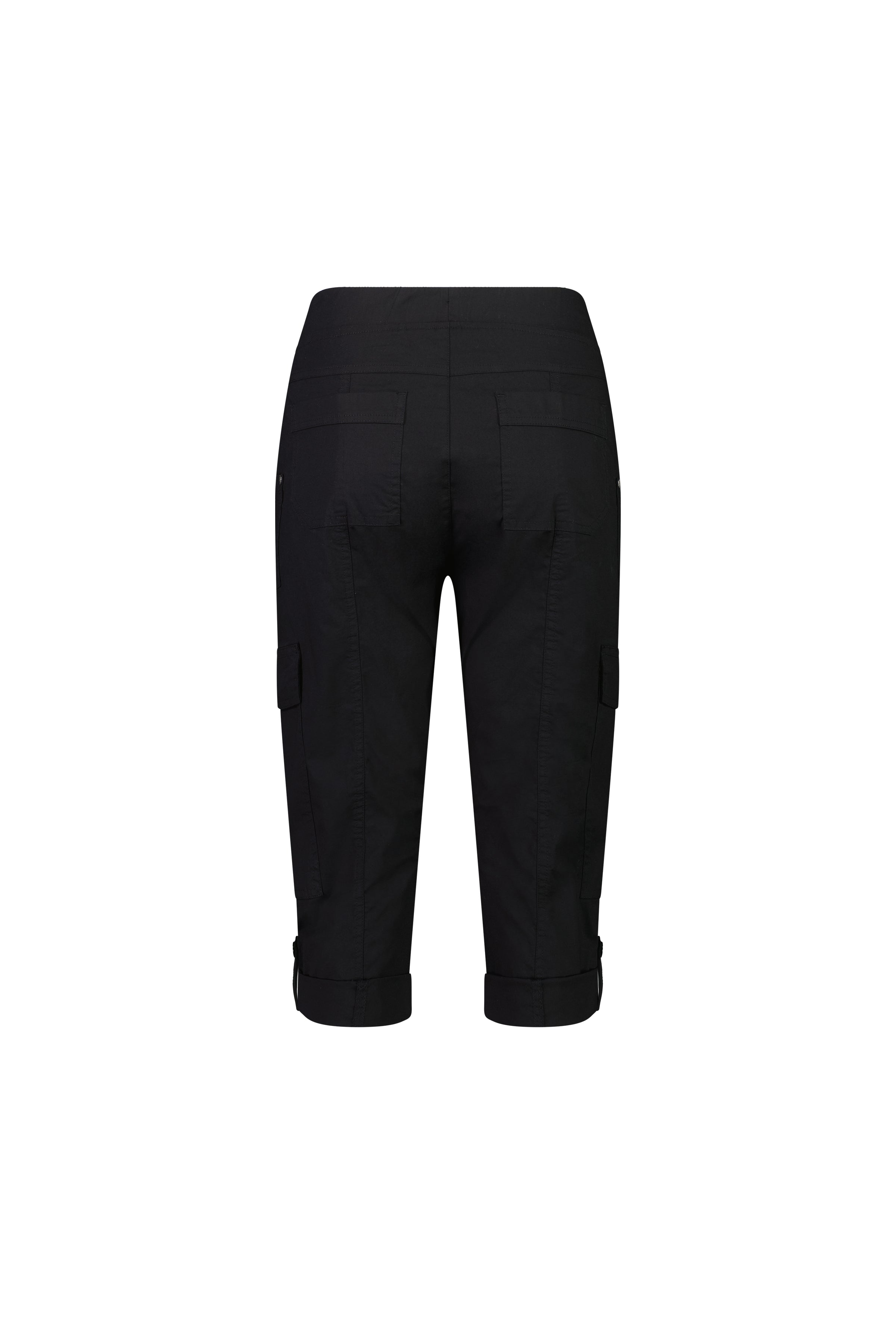 The Vassalli Wave Pant - Black is a knee-length cargo style with seat and side flap pockets, adjustable waistband, and buttoned cuff straps. Made from stretch poplin, it’s shown from the back against a white background.