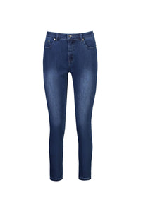 The Vassalli Icon Jean in blue denim features a mid-rise waist, belt loops, button and zip closure, five pockets, and a skinny leg ankle grazer fit, shown on a white background.