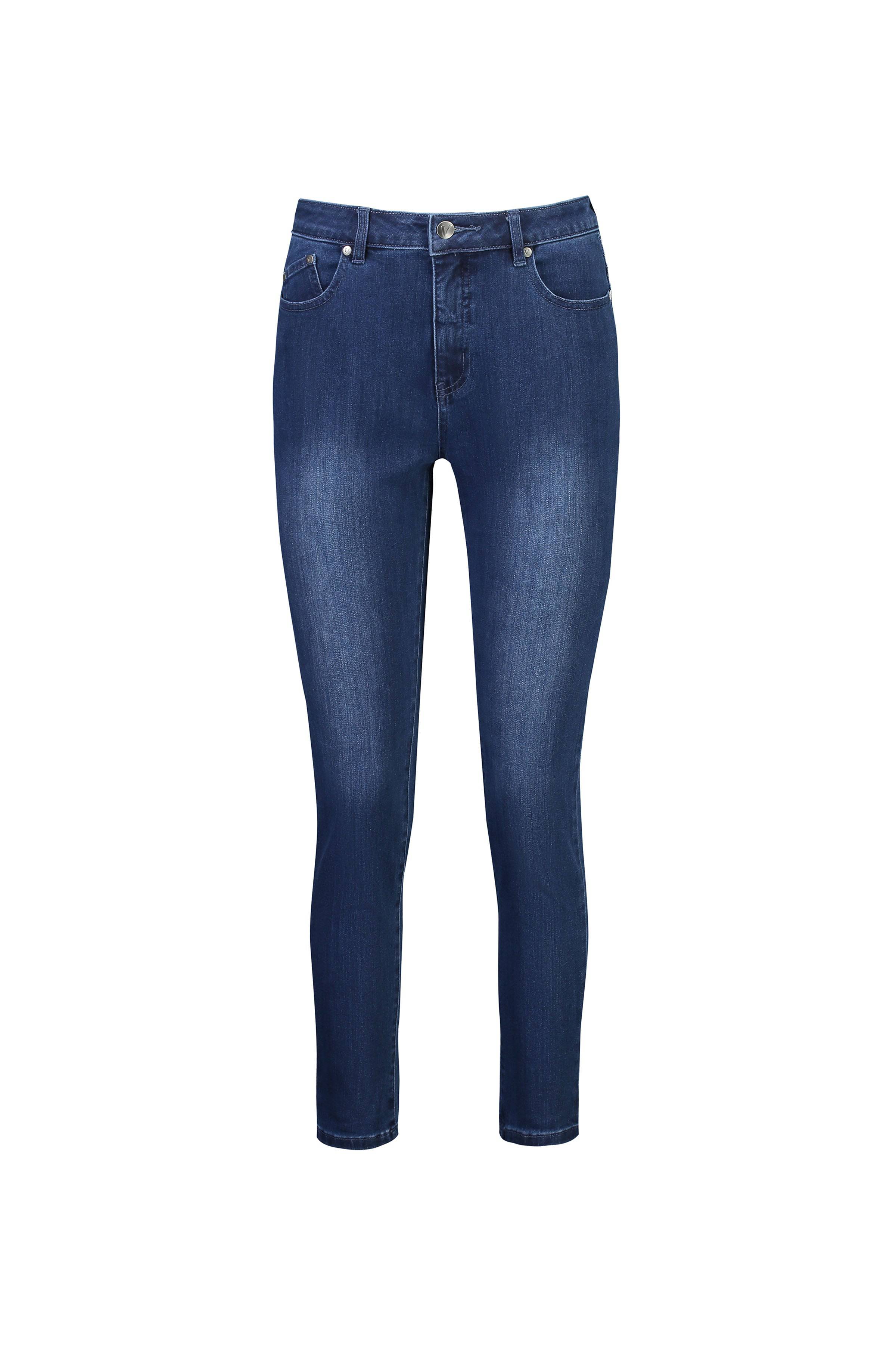 The Vassalli Icon Jean in blue denim features a mid-rise waist, belt loops, button and zip closure, five pockets, and a skinny leg ankle grazer fit, shown on a white background.