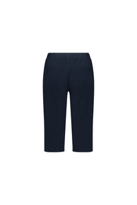 The Vassalli Drew 3/4 Pant in Ink is a navy blue, knee-length stretch cotton short with an elastic waistband and two back pockets, shown from the back on a white background.