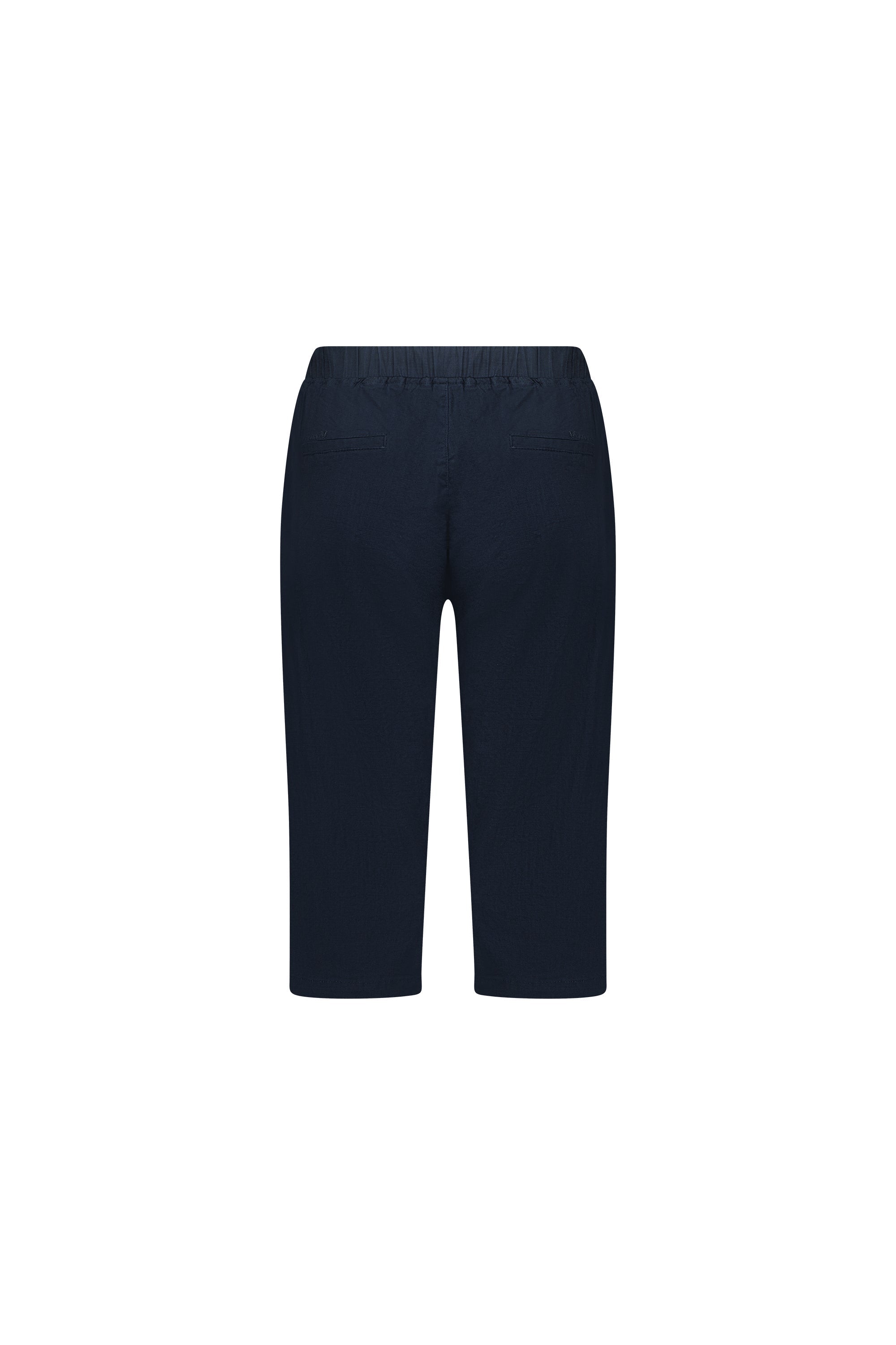 The Vassalli Drew 3/4 Pant in Ink is a navy blue, knee-length stretch cotton short with an elastic waistband and two back pockets, shown from the back on a white background.