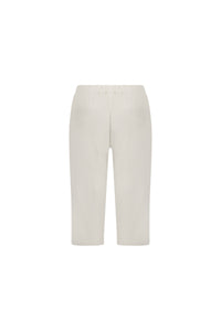 Back view of the Vassalli Drew 3/4 Pant in Stone, featuring straight legs, stretch cotton fabric, an elastic waistband, and two back welt pockets, shown against a plain white background.