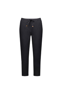 The Vassalli Denver 7/8 Pant in black is shown against a white background. These cotton blend pants have a relaxed fit, slightly tapered legs, and an elastic waistband with drawstring for adjustable comfort.