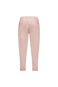Back view of Vassalli Denver 7/8 Pant in Soft Pink, featuring a skinny leg, elastic waistband, and two back pockets, shown on a white background.