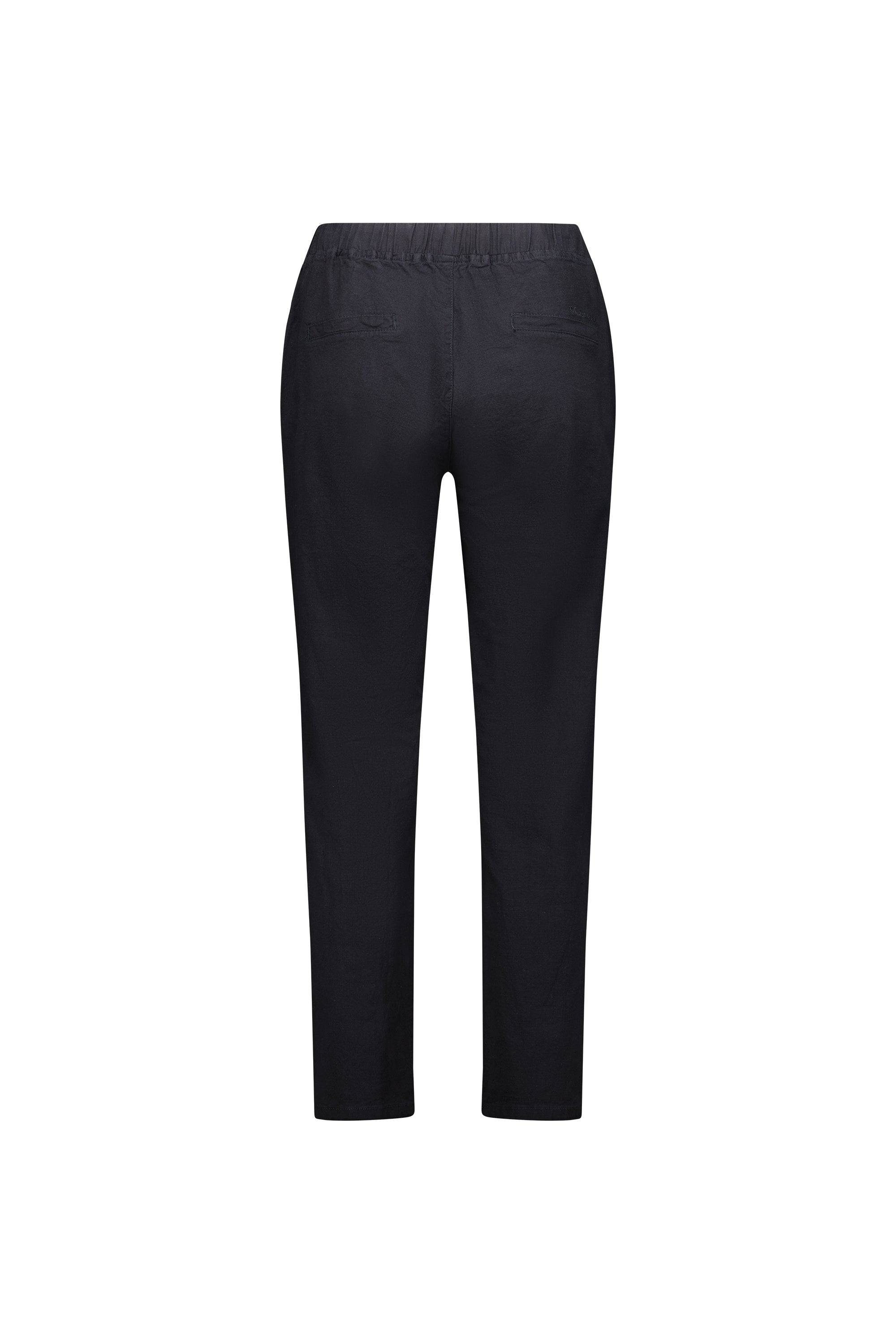 Back view of the Vassalli Leonie 7/8 Pant in black, featuring an elastic waistband and straight legs, made from stretch fabric and shown on a white background.