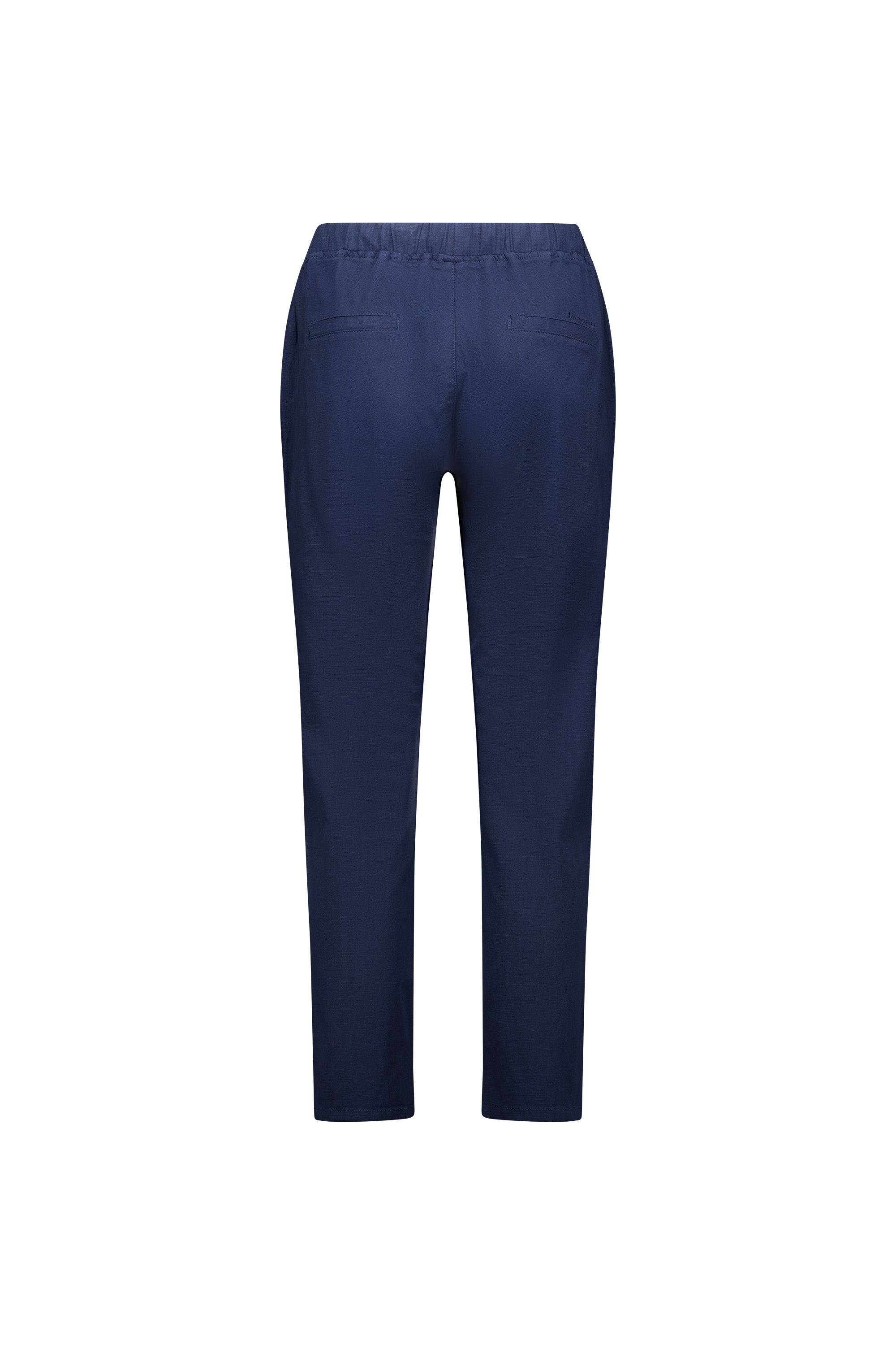 The Vassalli Leonie 7/8 Pant in Ink is shown from the back on a white background, featuring an elastic waistband, stretch fabric, and two back welt pockets.
