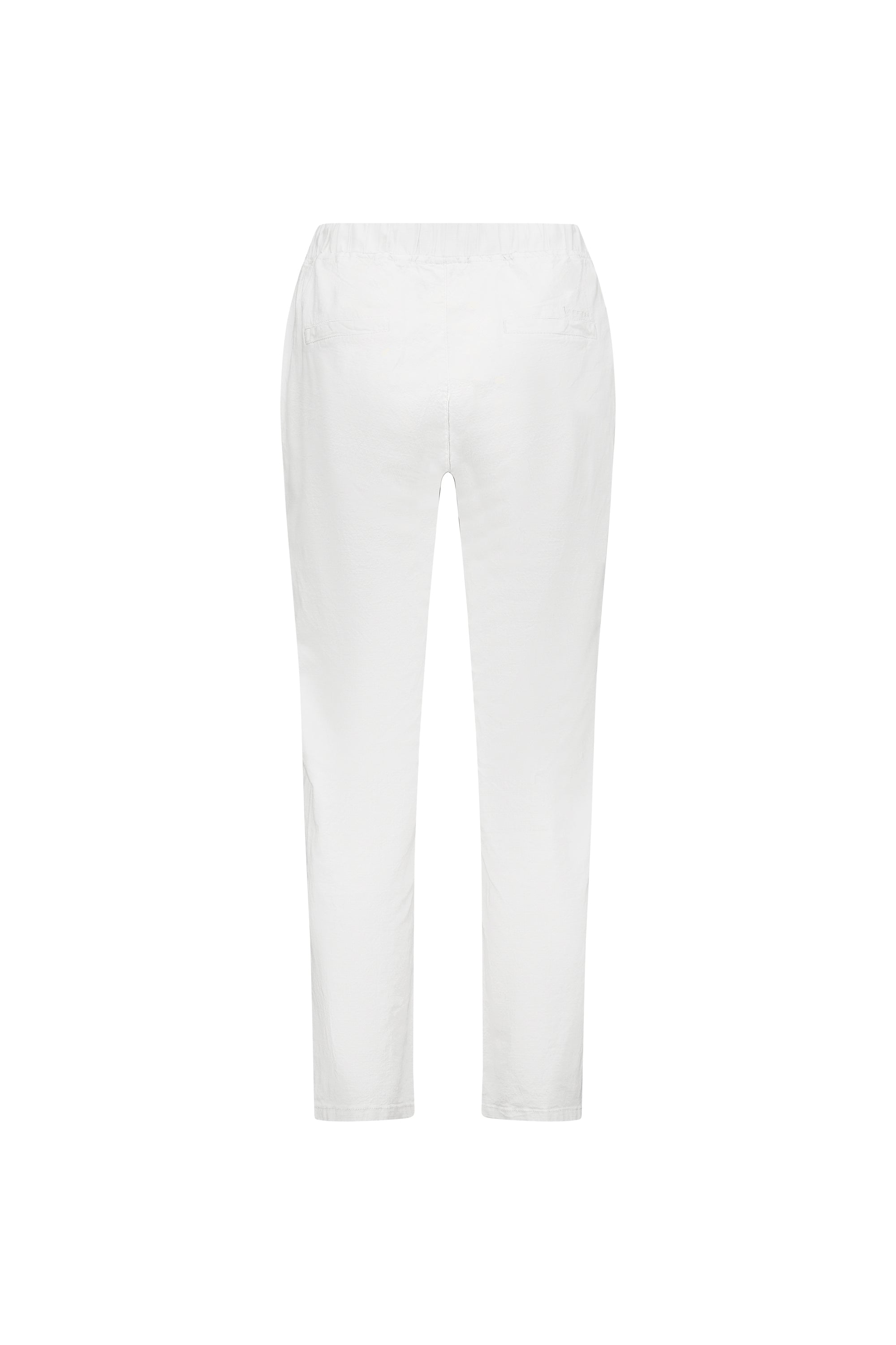 Back view of the Vassalli Leonie 7/8 Pant in white, featuring a slim leg, elastic waistband, and straight legs crafted from stretch fabric for comfort, shown on a white background.