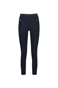 The Vassalli Concept Pant in navy features a fitted silhouette, ankle grazer length, two small front zipper pockets, and belt loops, displayed on a white background.