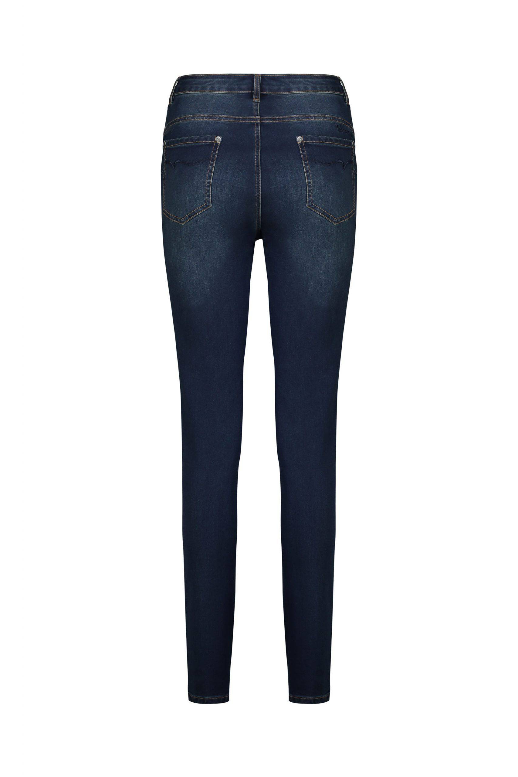 The Vassalli Skinny Leg Jean - Deep Blue features a high-rise, stretch fit with two back pockets, visible stitching, and a flattering tapered leg in a classic deep blue wash.