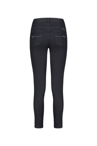 Back view of the Vassalli Ankle Grazer Jean in black denim, high-rise skinny fit with two rear pockets featuring decorative stitching and a small logo on the right pocket, shown on a white background.
