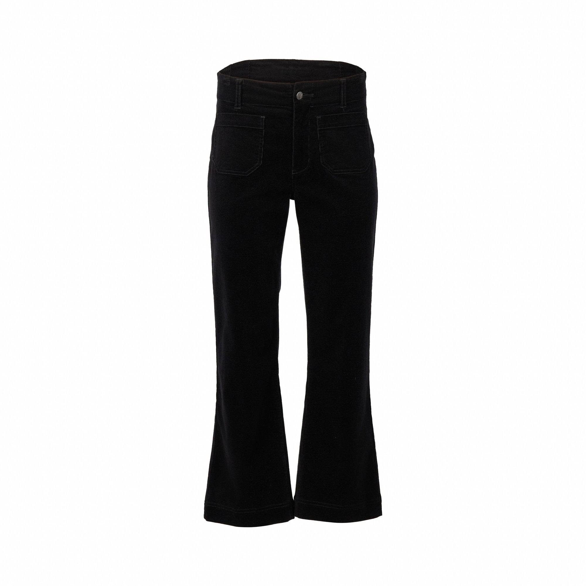 The Vassalli Daily Cord Pant in black features a high waist, stretch fabric for comfort, front pockets, and slightly flared legs, shown against a white background.