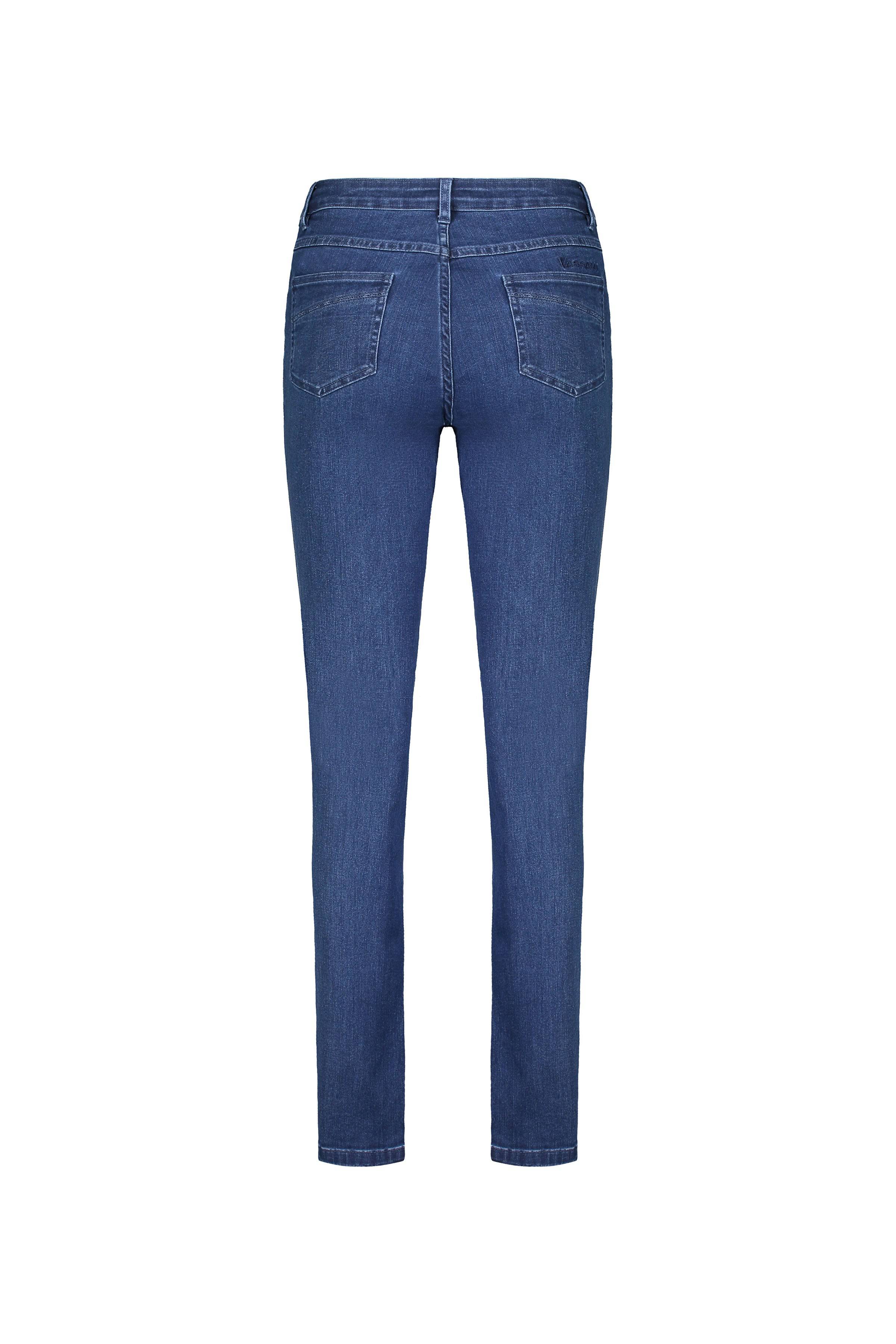 Back view of the Vassalli Studio Jean in blue denim, featuring two back pockets, belt loops, and slim legs, displayed on a white background.