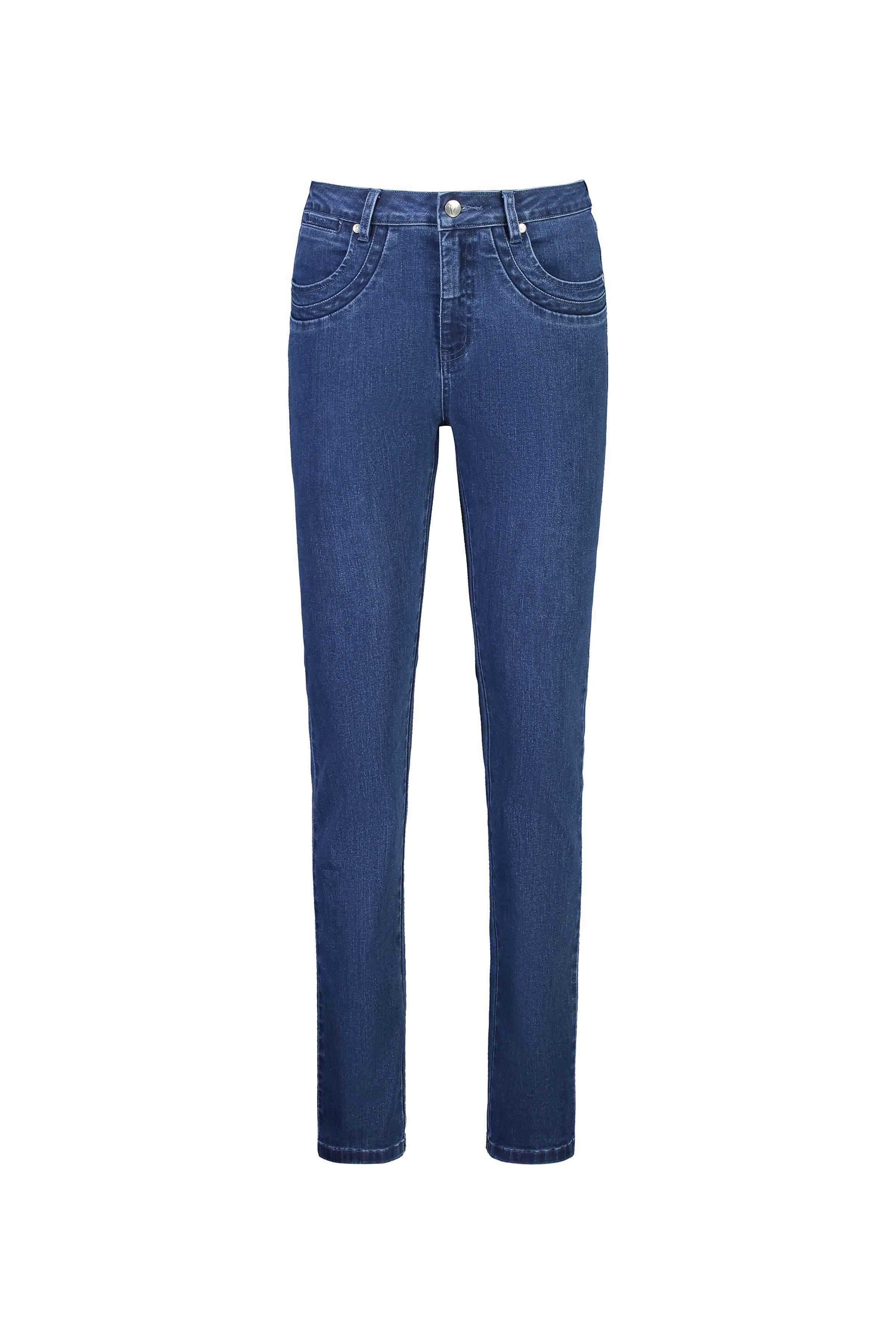 The Vassalli Studio Jean in blue denim features a straight-leg cut, front and back pockets, and a button-zip closure, shown on a white background.