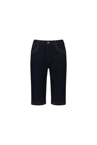 The Vassalli Custom Short - Indigo Denim features a dark blue straight-leg fit in stretch fabric, with front and back pockets, button and zip closure, and decorative stitching, shown against a white background.