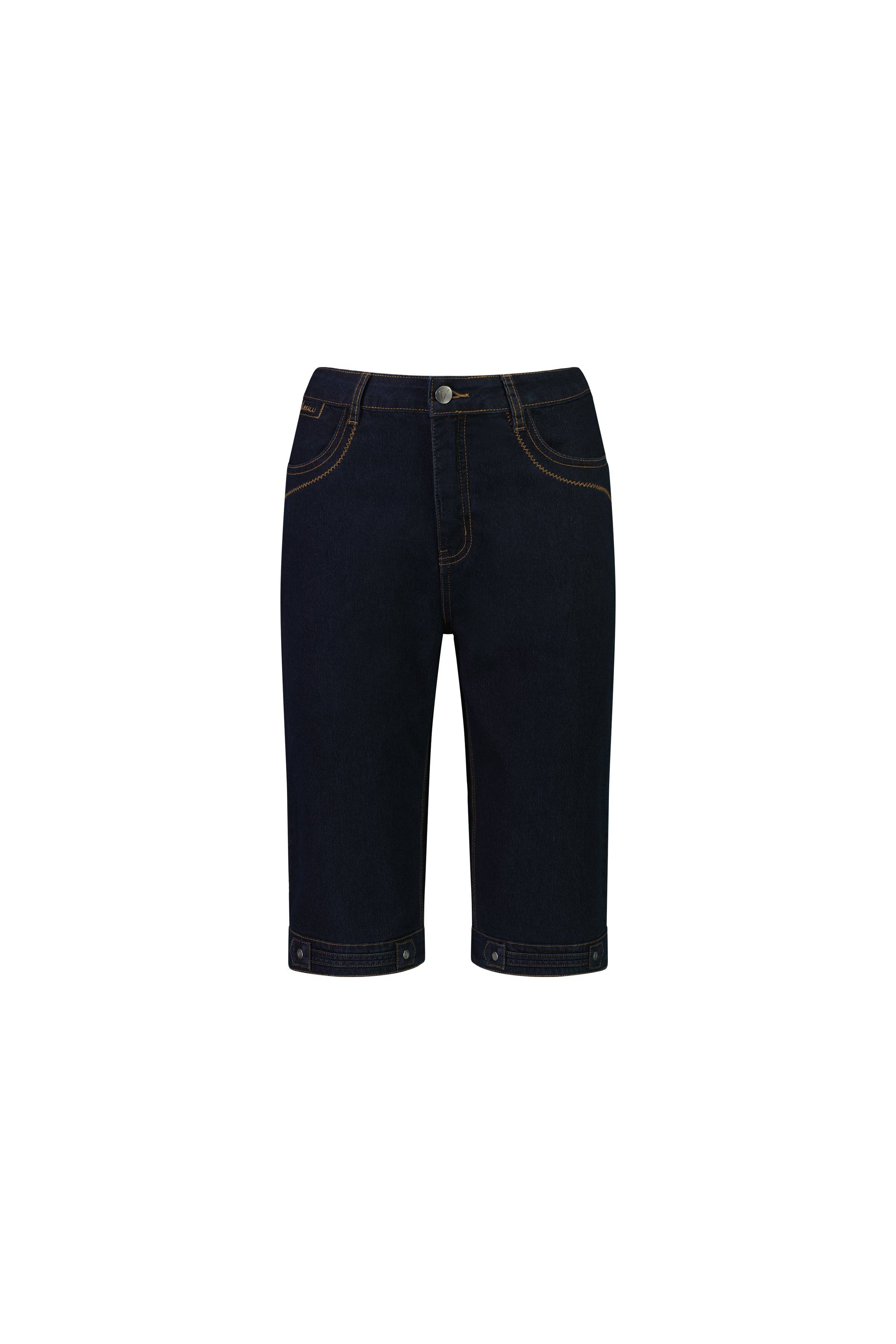 The Vassalli Custom Short - Indigo Denim features a dark blue straight-leg fit in stretch fabric, with front and back pockets, button and zip closure, and decorative stitching, shown against a white background.