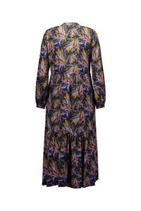 Back view of long sleeve midi dress with vibrant floral print on black background