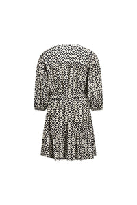 Back view of a black and white geometric patterned short dress with half sleeves