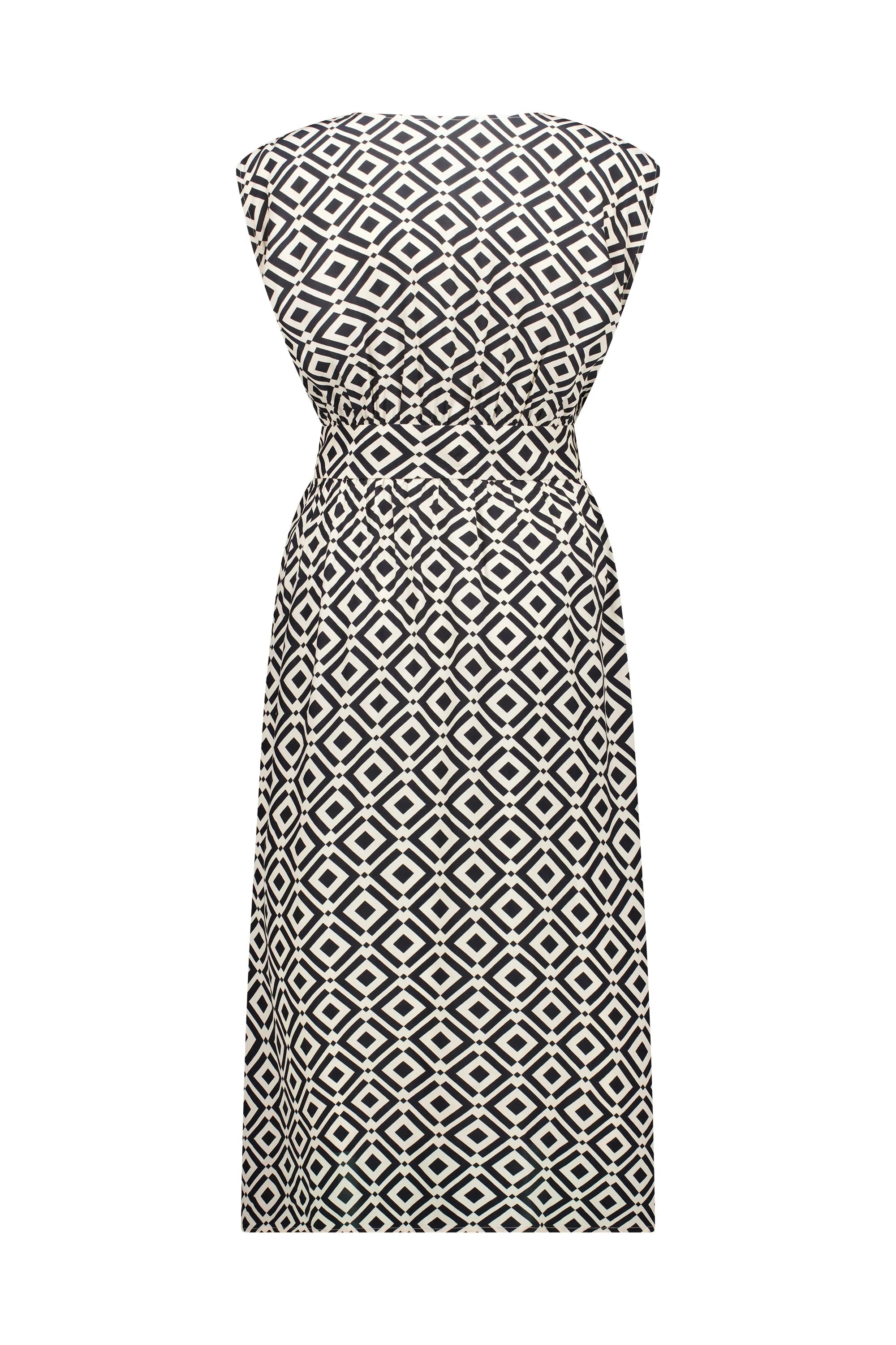Back view of black and white geometric print midi dress with sleeveless design