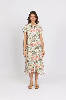 Woman wearing a floral button-down midi dress with short sleeves and ruffle hem