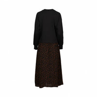 Back view of a long sleeve black top and mocha pattern midi skirt dress