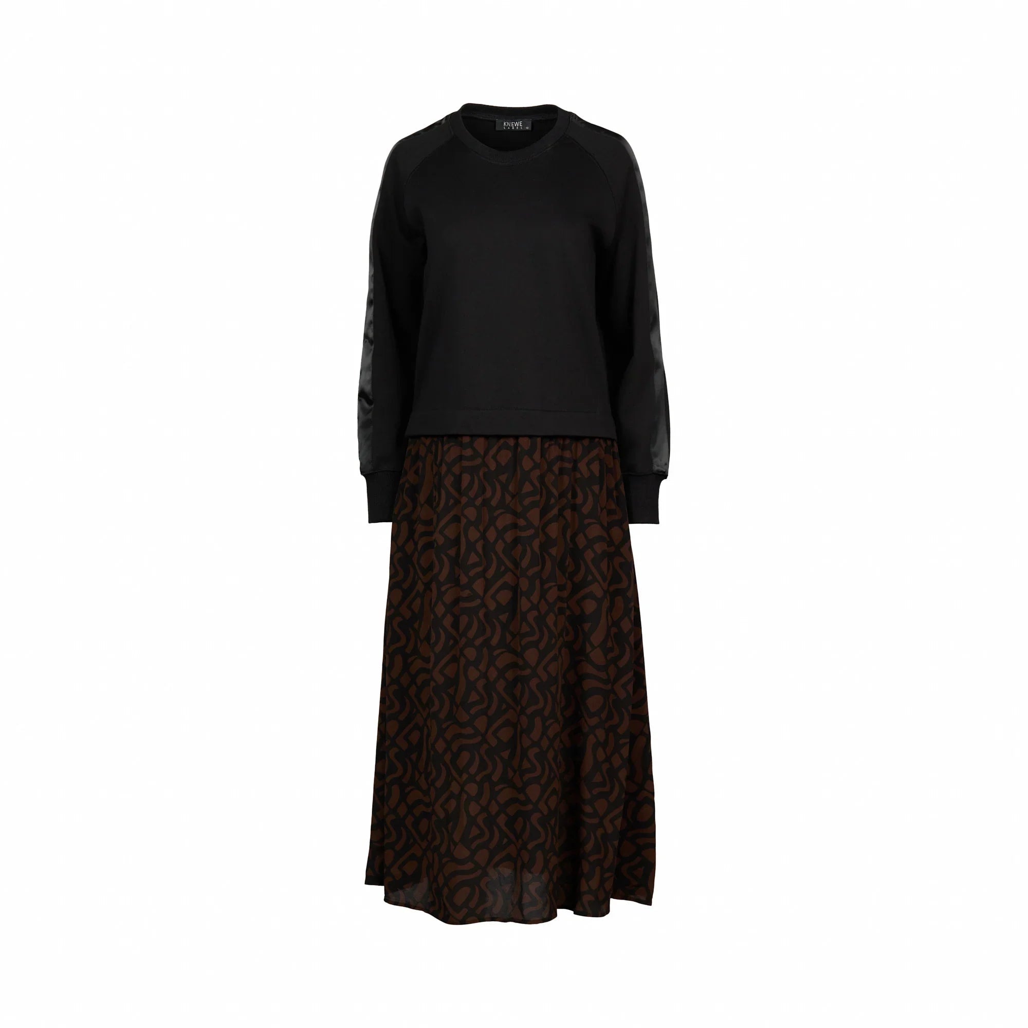 Black long sleeve dress with patterned mocha brown skirt, contemporary New Zealand fashion.