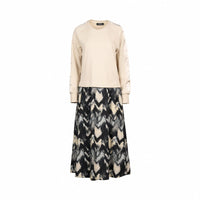 Long sleeve beige top with an abstract black and cream patterned midi skirt dress