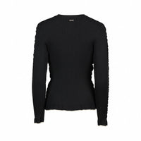 Back view of black ribbed knit sweater with long sleeves and white trim on cuffs and hem