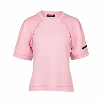 Light pink short sleeve women's tee with black arm detail and relaxed fit on white background