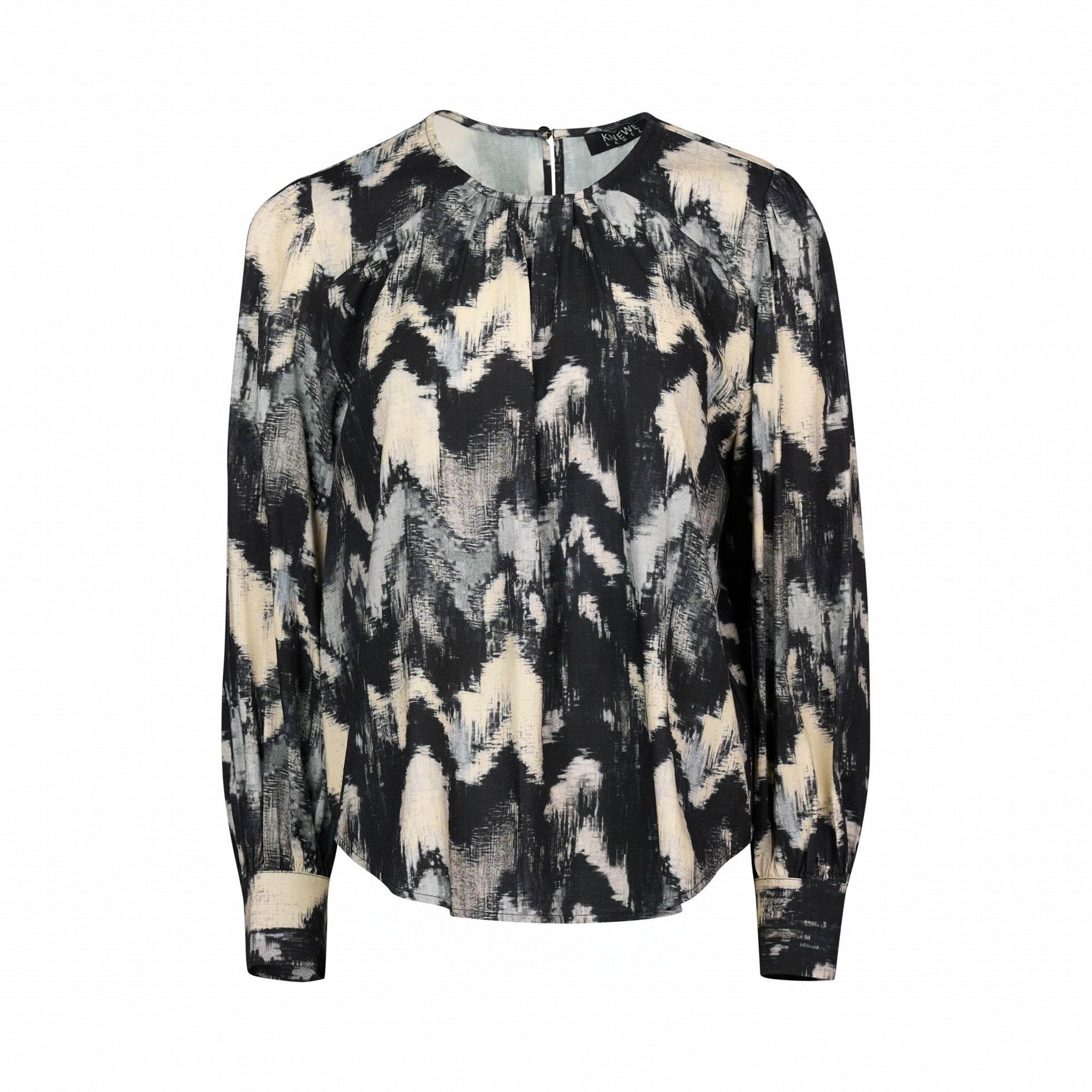 Long sleeve blouse with abstract black, grey, and cream pattern, front view