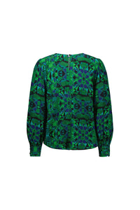 Back view of green and blue kaleidoscope print long sleeve blouse with button cuffs