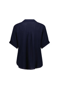 Back view of a navy short sleeve shirt with cuffed sleeves and relaxed fit