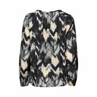 Back view of a long sleeve blouse with abstract black, grey, and cream pattern