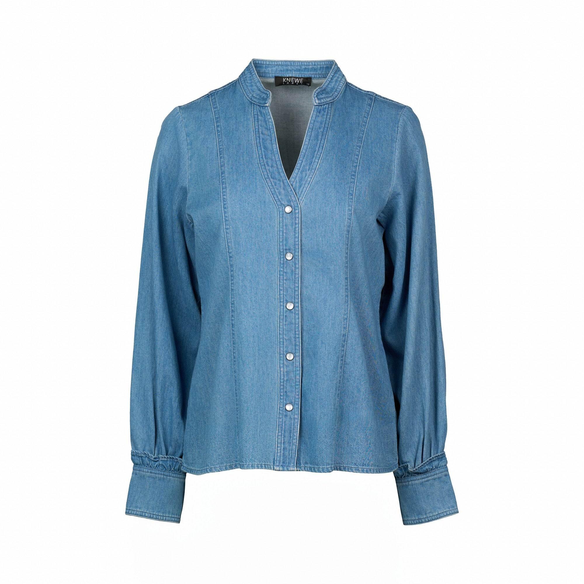 Women's blue denim shirt with long sleeves, button front, and band collar