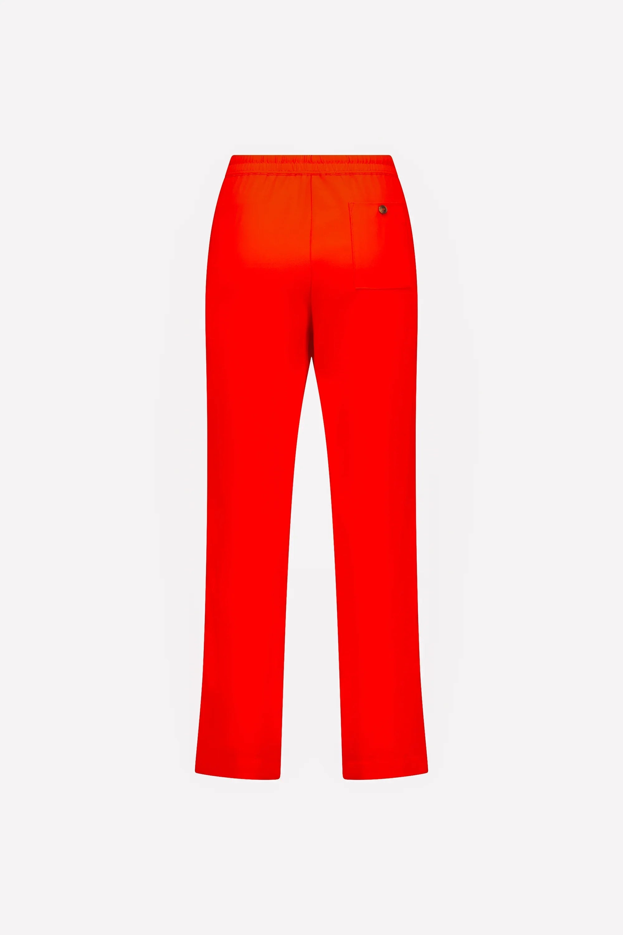 Back view of straight-leg blood orange pants with elastic waist and single back pocket