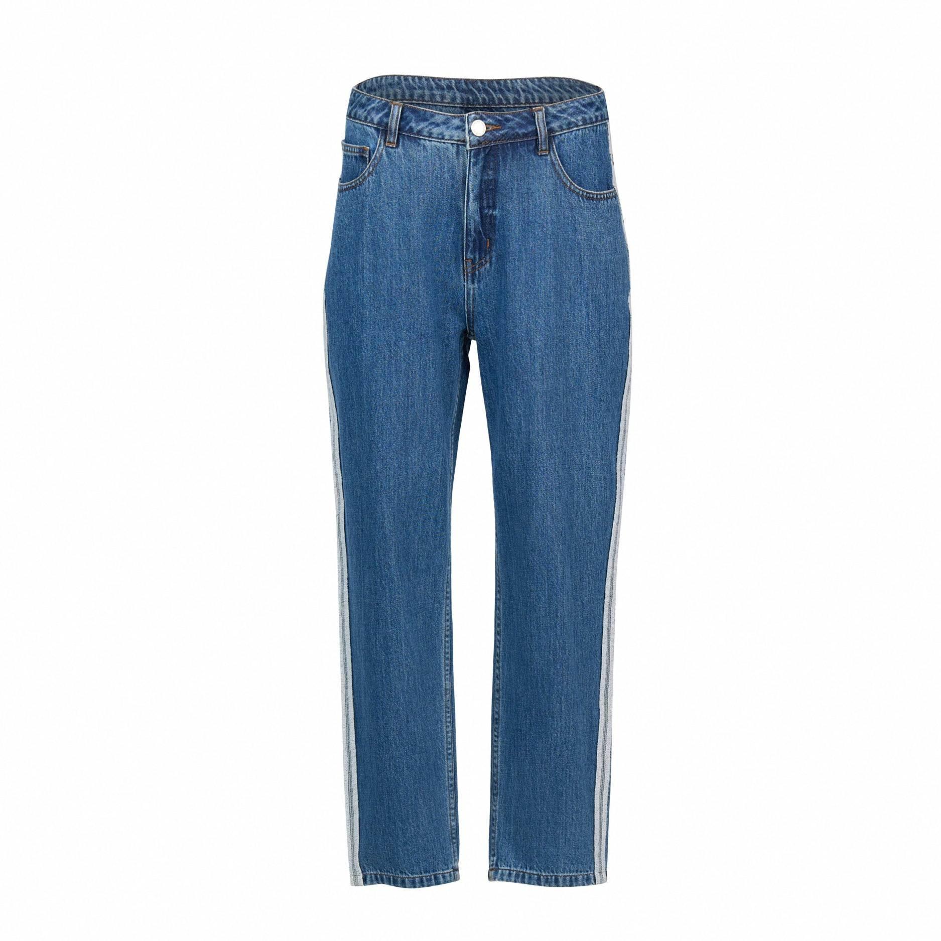 Straight leg blue denim jeans with high waist and white side stripe detail on white background