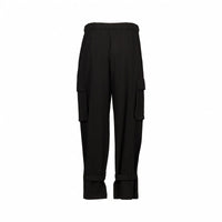 Back view of black cargo pants with elastic waistband and side pockets on white background