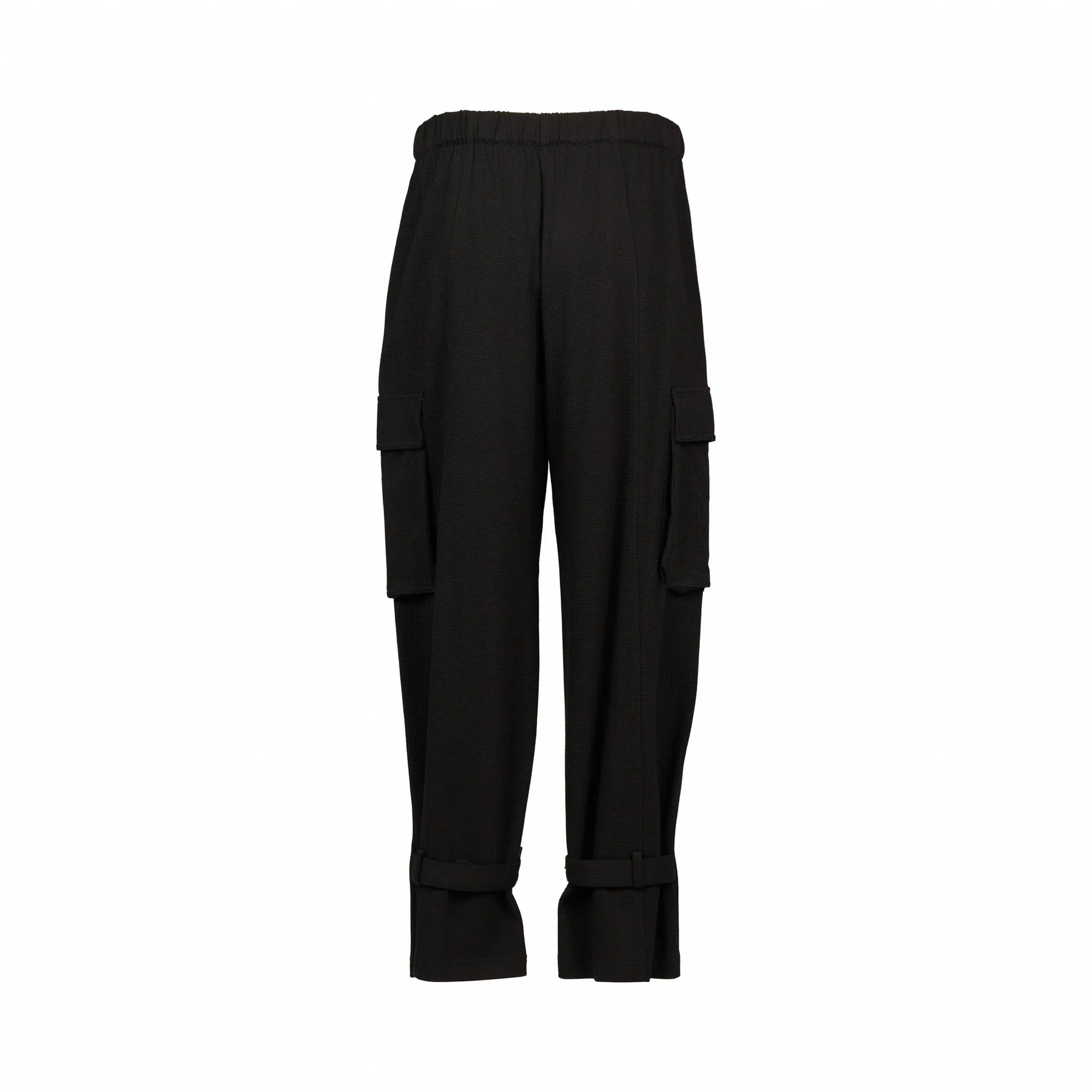 Back view of black cargo pants with elastic waistband and side pockets on white background