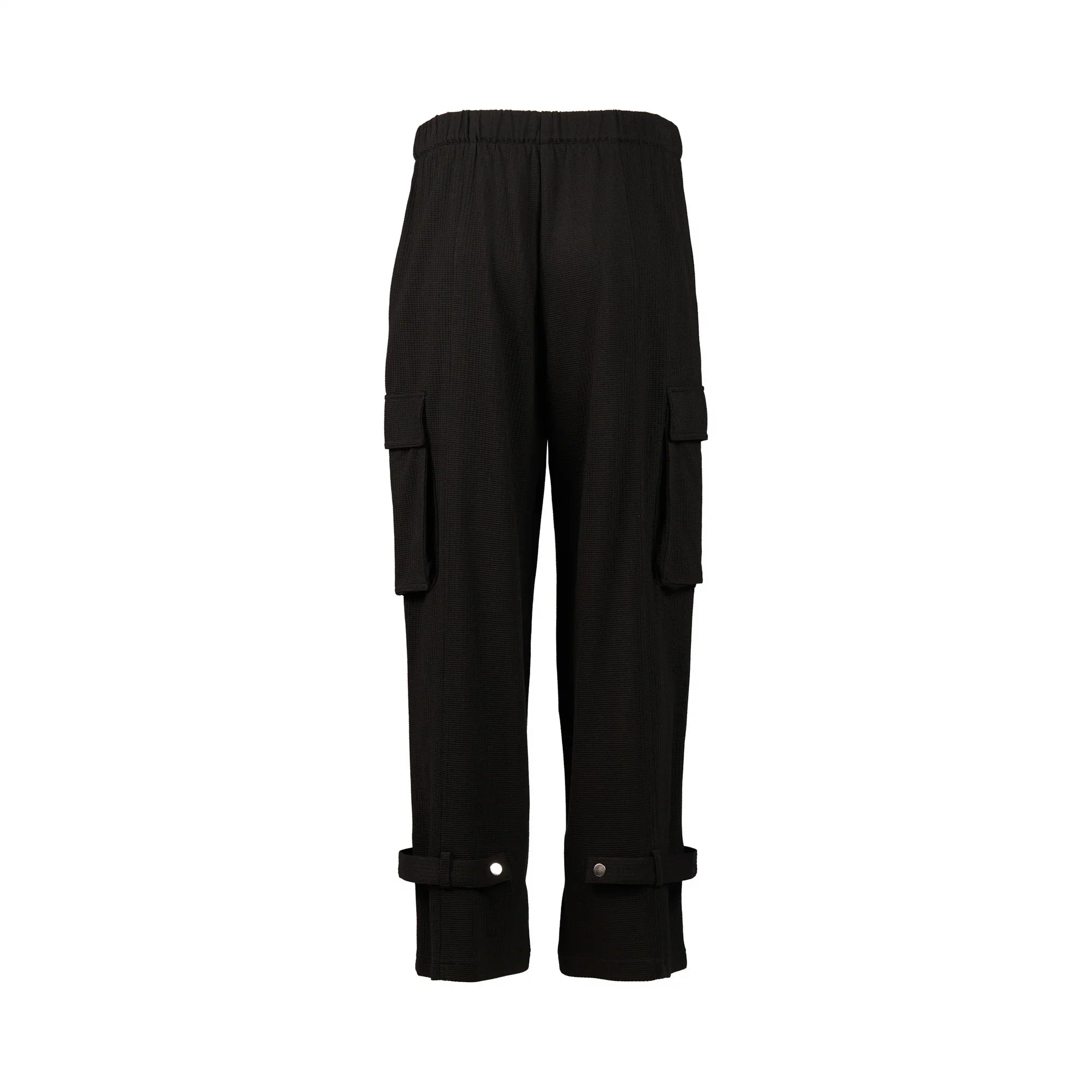 Black cargo pants with flap pockets and buttoned cuffs, back view on white background
