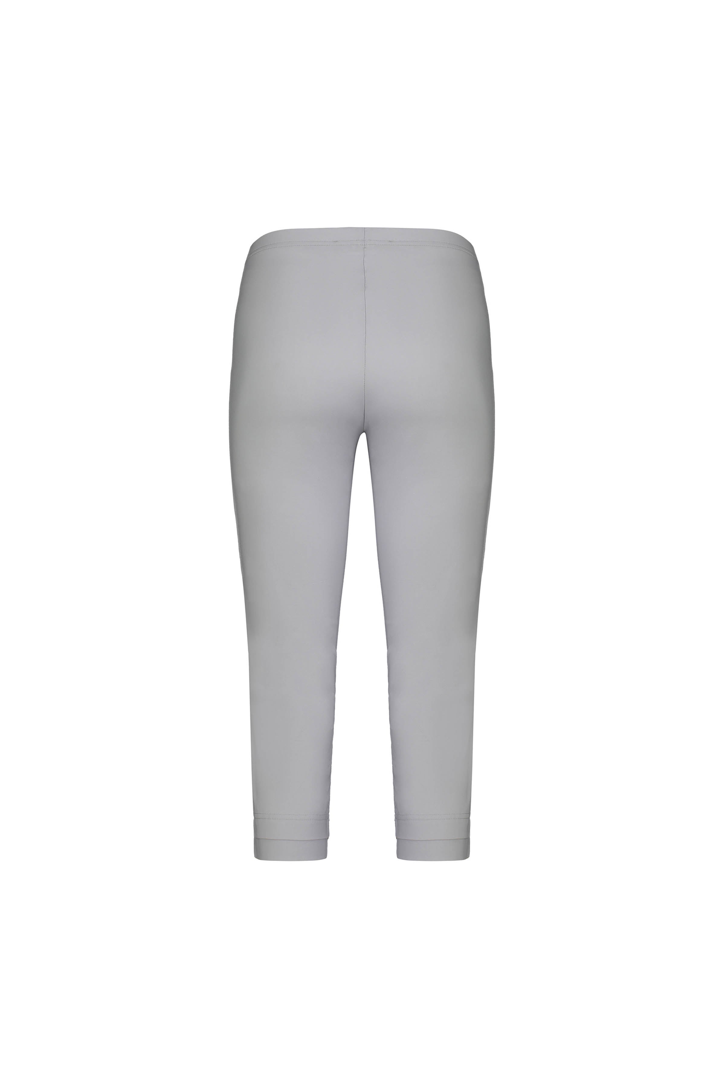 The Vassalli Paris 3/4 Pant in Silver features light gray, high-waisted, cropped leggings crafted from stretch fabric and is shown from the back on a white background.