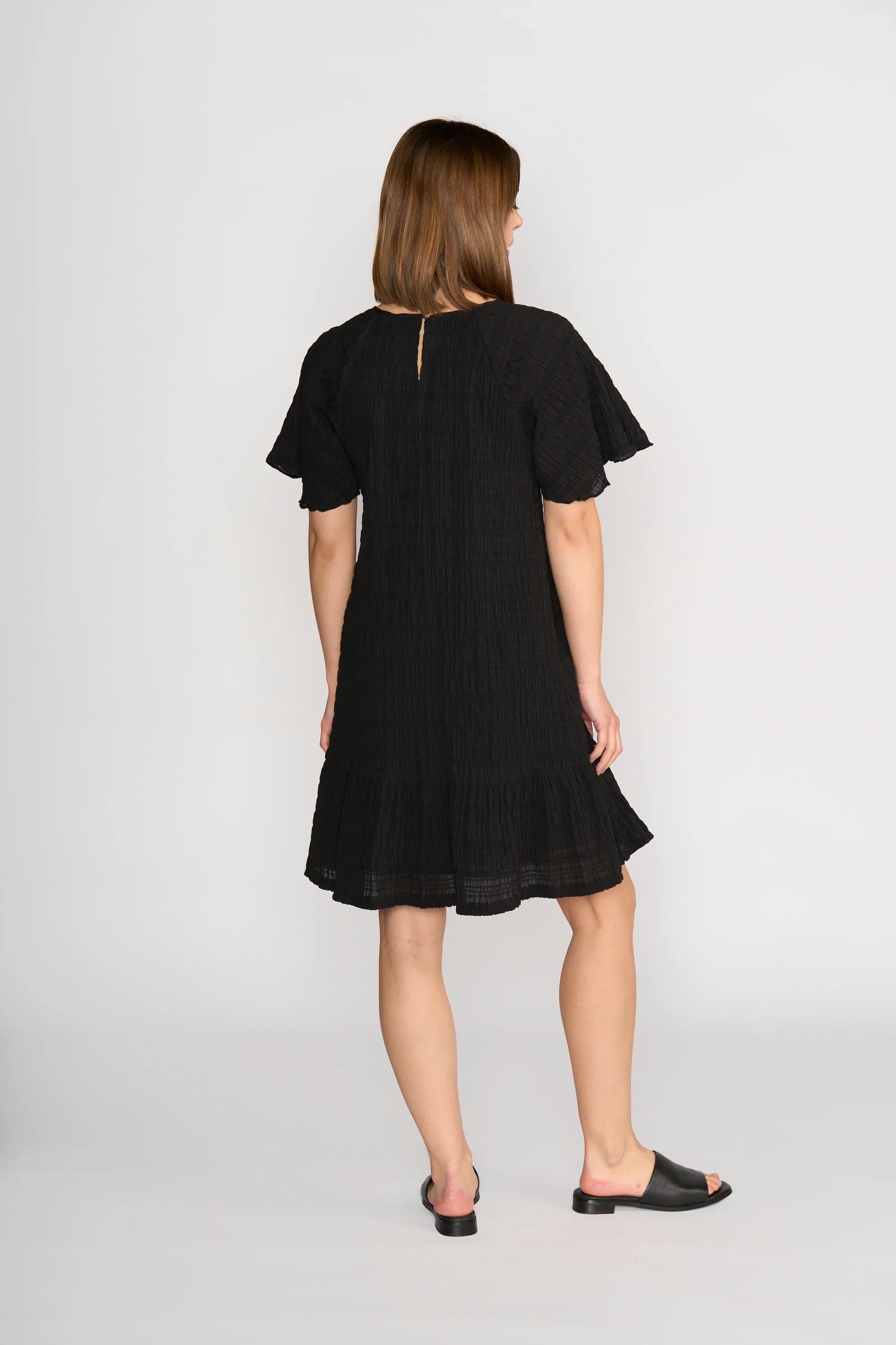 KNEWE Label women's K1048 Eclipse Dress Black in Texture - close-up fabric detail