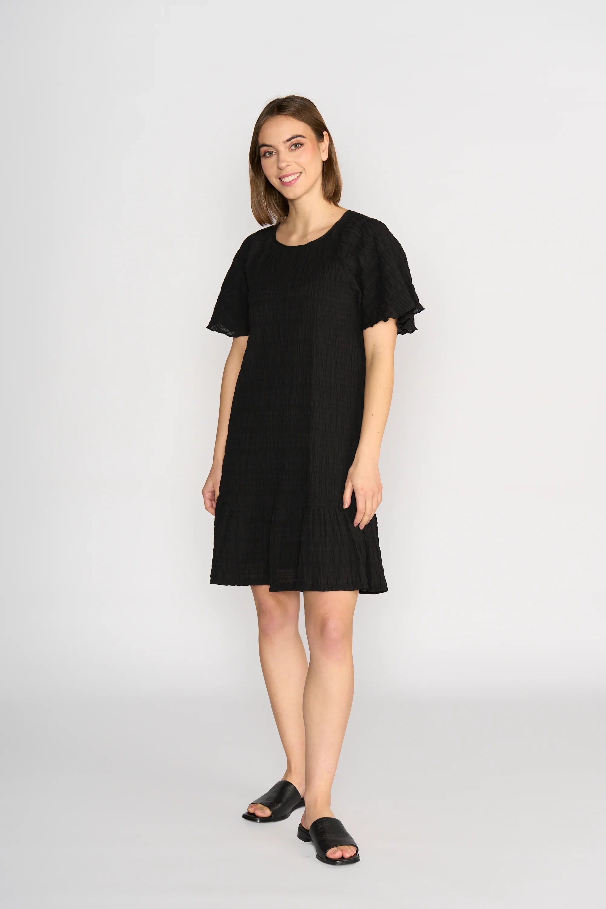 KNEWE Label women's K1048 Eclipse Dress Black in Texture - close-up fabric detail