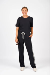 KNEWE Label women's K1049 Universal Jumpsuit Ink Off in White - close-up fabric detail