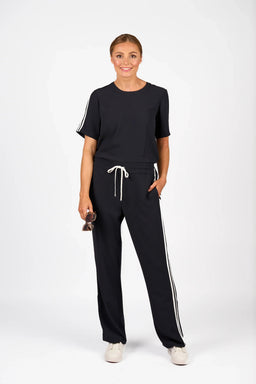 KNEWE Label women's K1049 Universal Jumpsuit Ink Off in White - close-up fabric detail